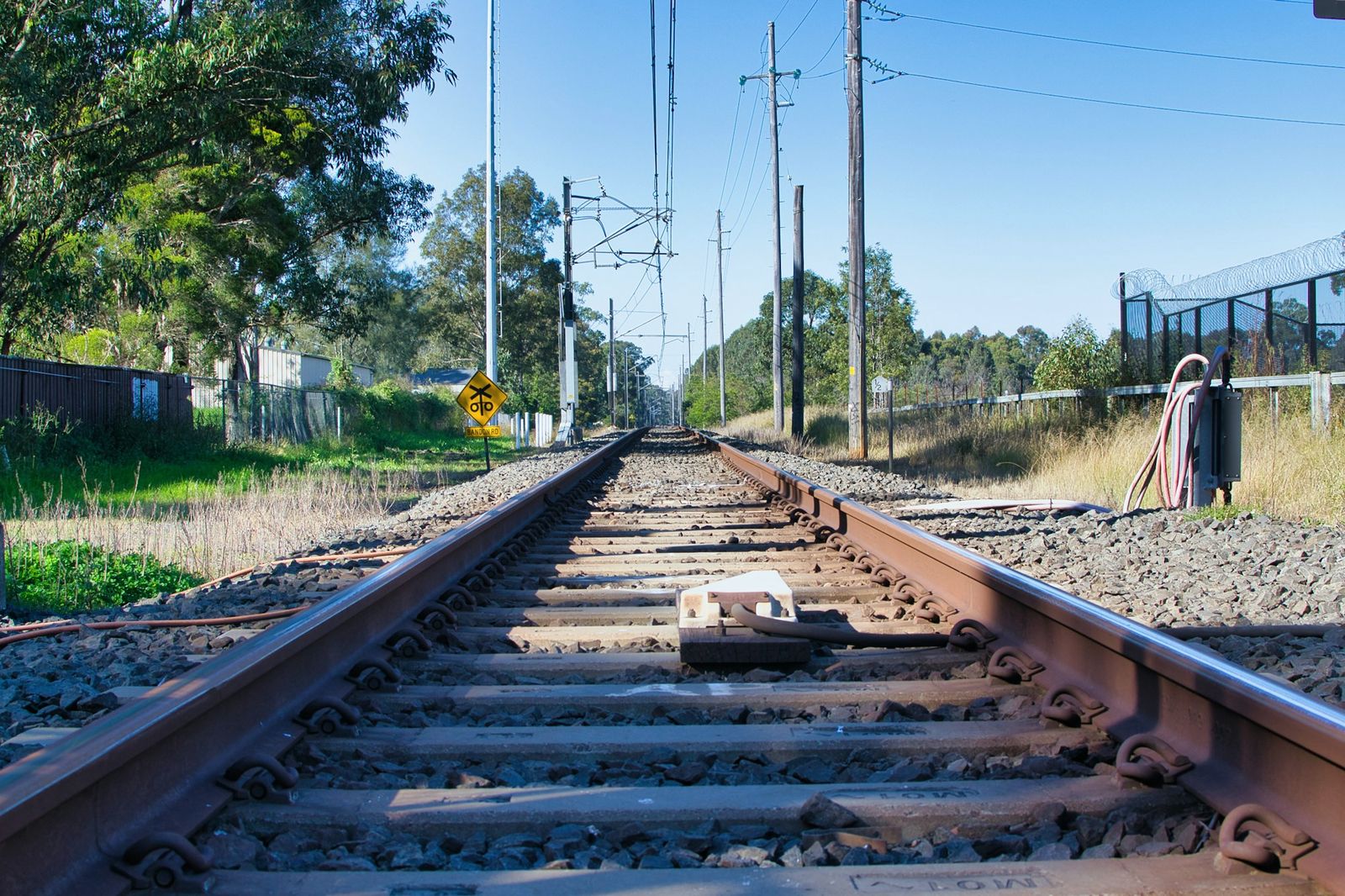 An electrified railway line running into the distance